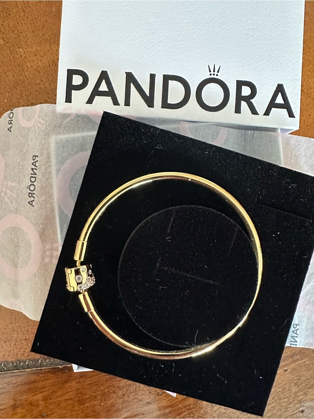 Pandora Gold Tone Bangle Bracelet with Logo Clasp